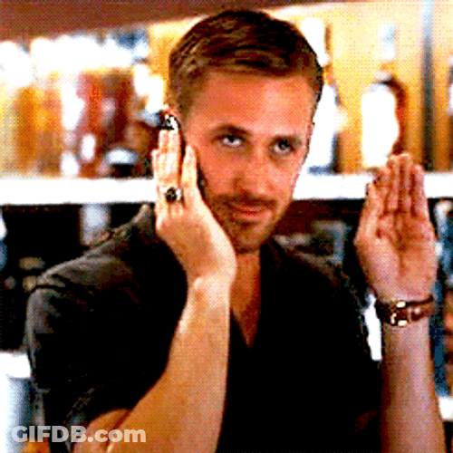 Ryan Gosling Waving While On The Phone GIF