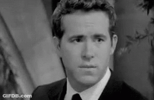 Ryan Reynolds Evil Smile GIF