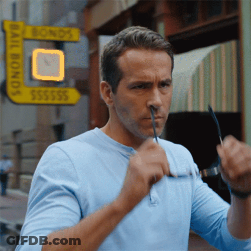 Ryan Reynolds Putting On Sunglasses GIF