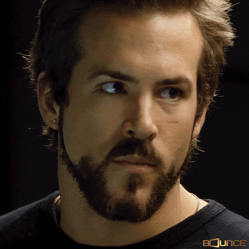 Ryan Reynolds Suspicious Look GIF