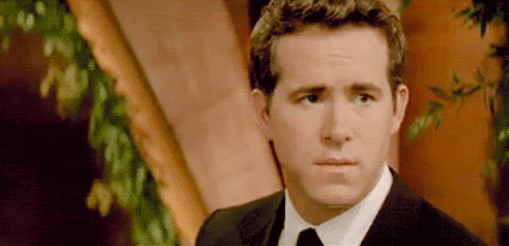 Ryan Reynolds Teasing Smirk GIF