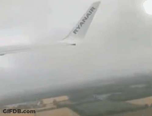 Ryanair Airplane Flying In Fog GIF