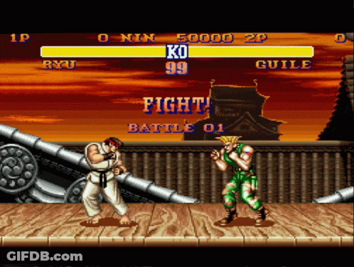 Ryu And Guile Fight In A Video Game GIF
