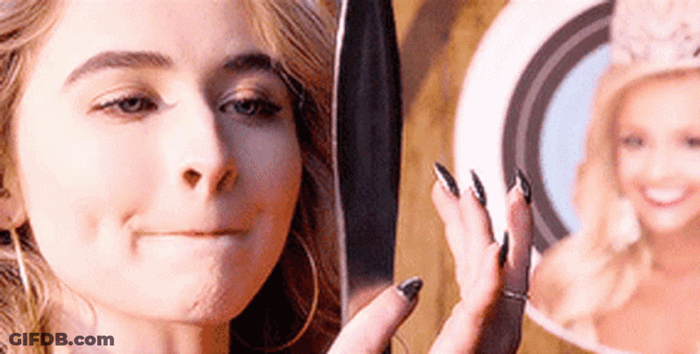 Sabrina Carpenter Looking At A Mirror GIF