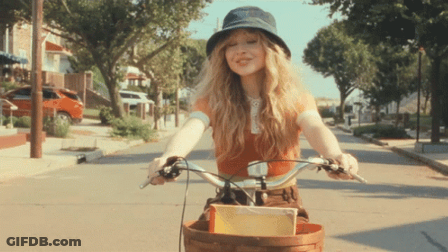 Sabrina Carpenter Riding A Bicycle GIF