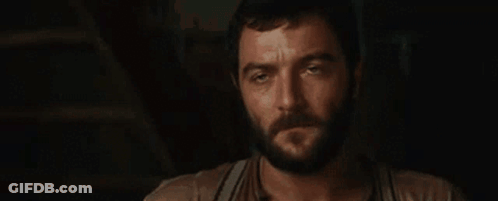 Sad Bearded Man In Suspenders GIF
