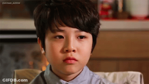 Sad Boy Sitting In Chair Eyes Closed GIF