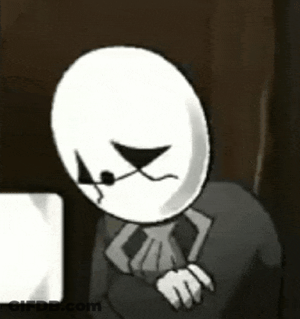 Sad Cartoon Character Sitting At Computer GIF