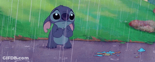 Sad Cartoon Character Standing In The Rain GIF