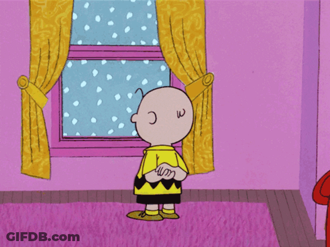 Sad Charlie Brown Watching Snow Storm GIF