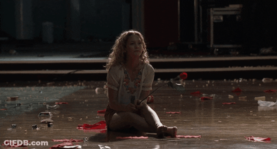 Sad Kate Hudson Holding A Rose GIF