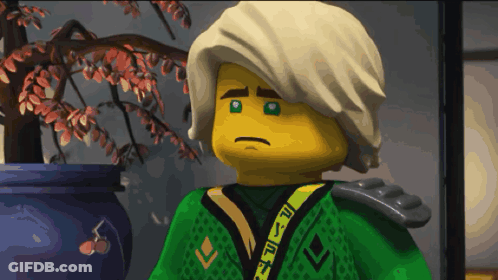 Sad Lego Character Standing In Front Of Potted Plant GIF