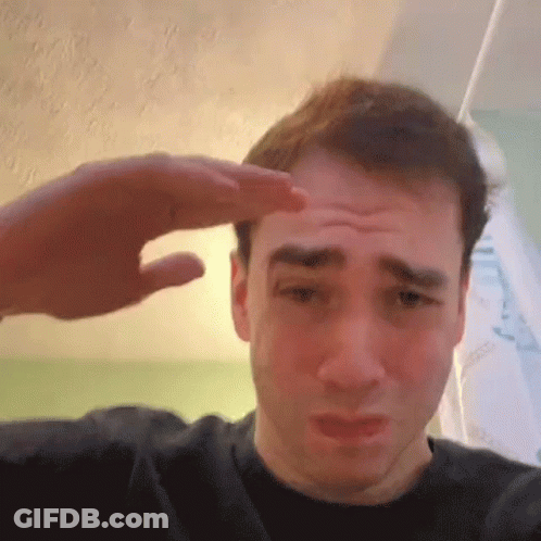 Sad Man With Hand On Forehead GIF