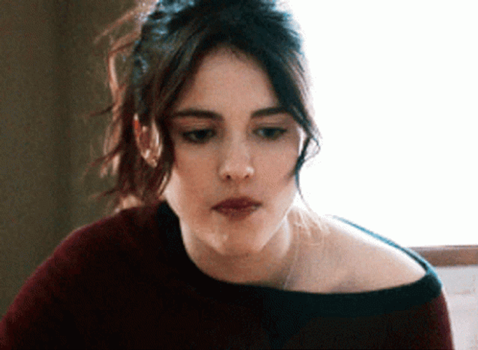 Sad Margaret Qualley Chewing Slowly GIF