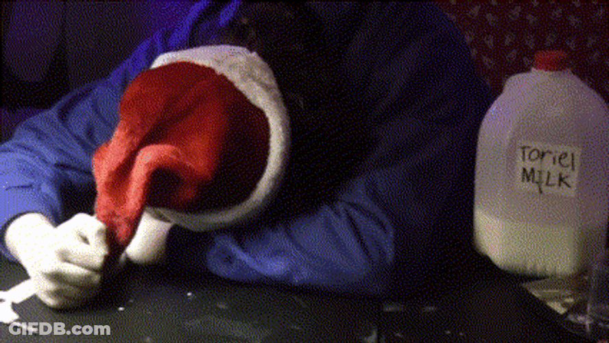Sad Santa Banging Head On Desk GIF