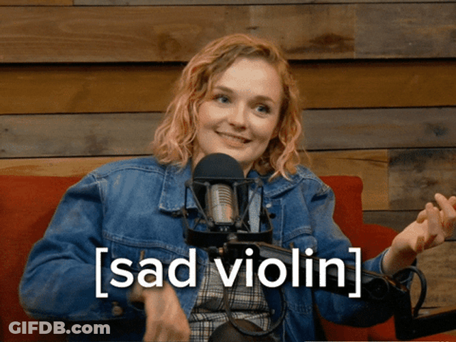 Sad Woman Performing Worlds Smallest Violin GIF