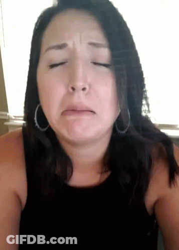 Sad Woman With Hoop Earrings GIF