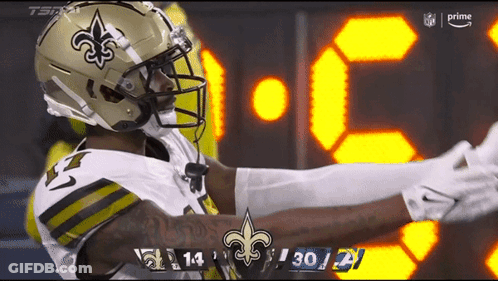 Saints Football Player Celebrating Touchdown Against Ravens GIF