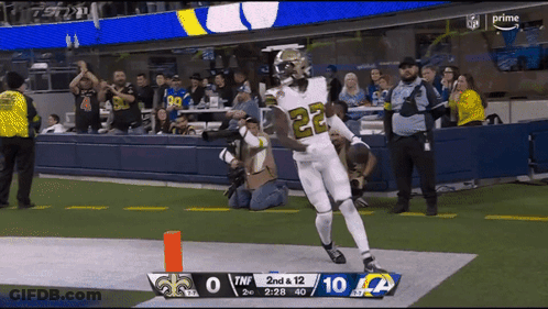 Saints Player Celebrating Touchdown Against Ravens GIF