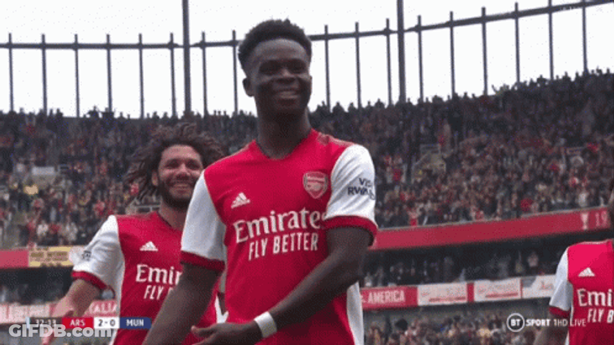 Saka Celebration Hug With The Teammates GIF