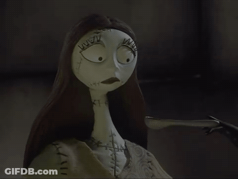 Sally From The Nightmare Before Christmas Has Stitches On Her Face And Neck GIF