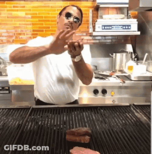 Salt Bae Tossing Meat On Grill GIF