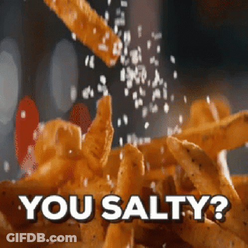 Salt Is Being Poured On A Pile Of French Fries With The Words You Salty Written Below It GIF