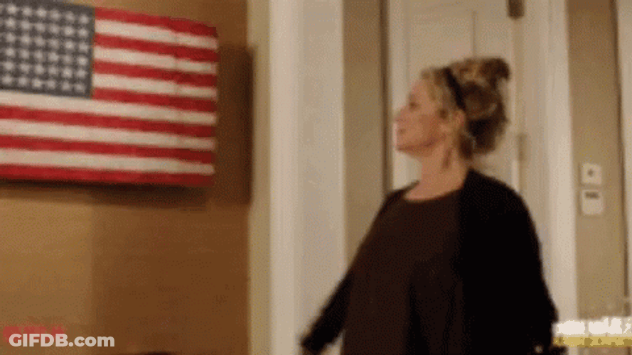 Saluting American Flag Waving GIF