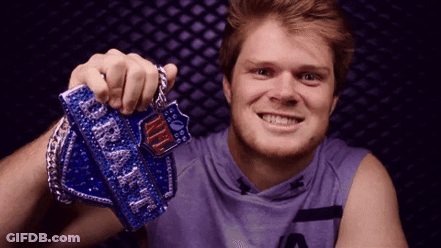 Sam Darnold Holding Draft Necklace GIF