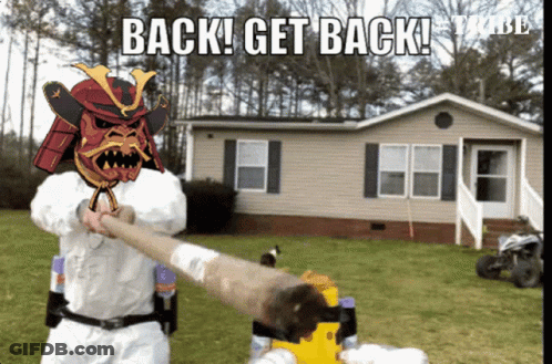 Samurai Holding Man's Arm In Front Of House Saying Back Get Back GIF