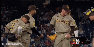 San Diego Baseball Players Shake Hands With Each Other During A Game GIF