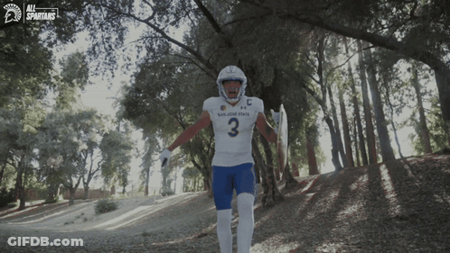 San Jose State Spartans Football Player Running Through Woods GIF