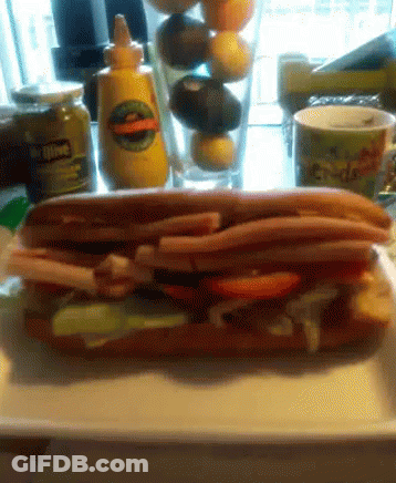 Sandwich On A Plate With Mustard Bottle GIF