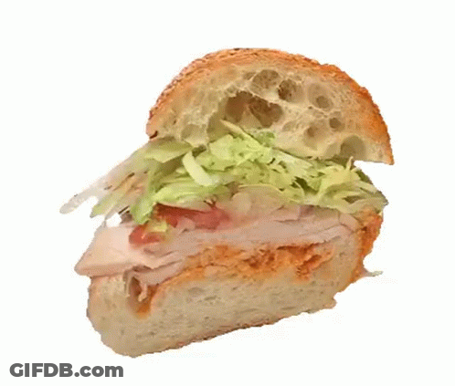 Sandwich With Lettuce Tomato And Onions On Sesame Seed Bun GIF