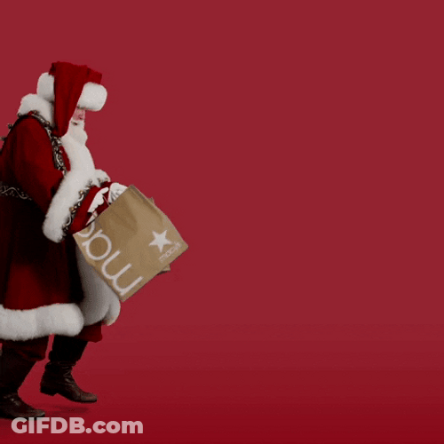 Santa Claus Passing With Gifts GIF