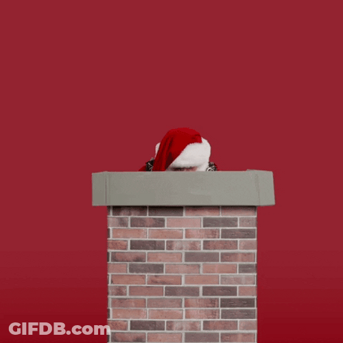 Santa Claus Showing From Chimney GIF