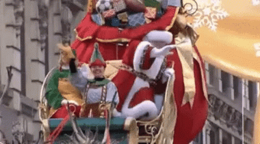 Santa Claus Waving Around GIF