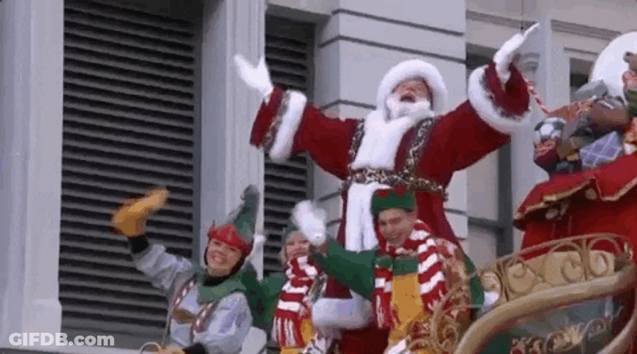 Santa Claus With Elves Waving GIF