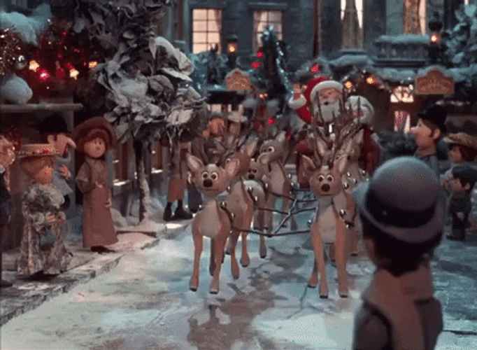 Santa Riding Reindeer Christmas Village GIF