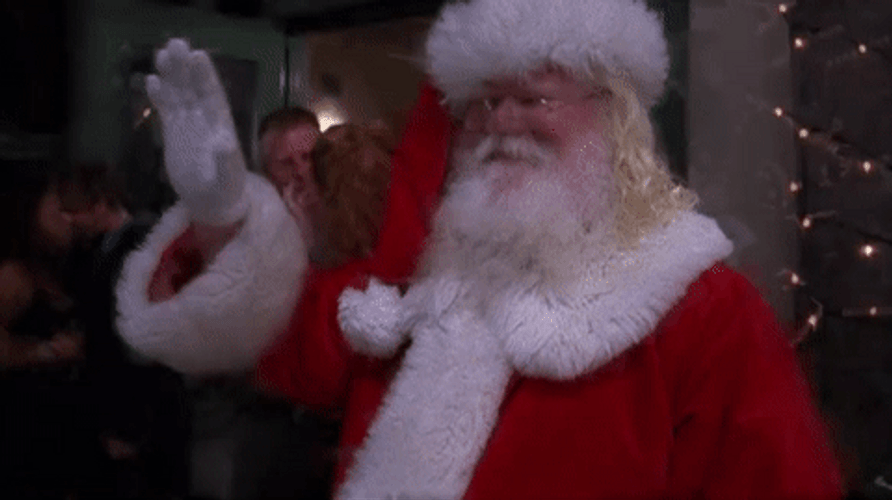 Santa Smiling While Waving GIF