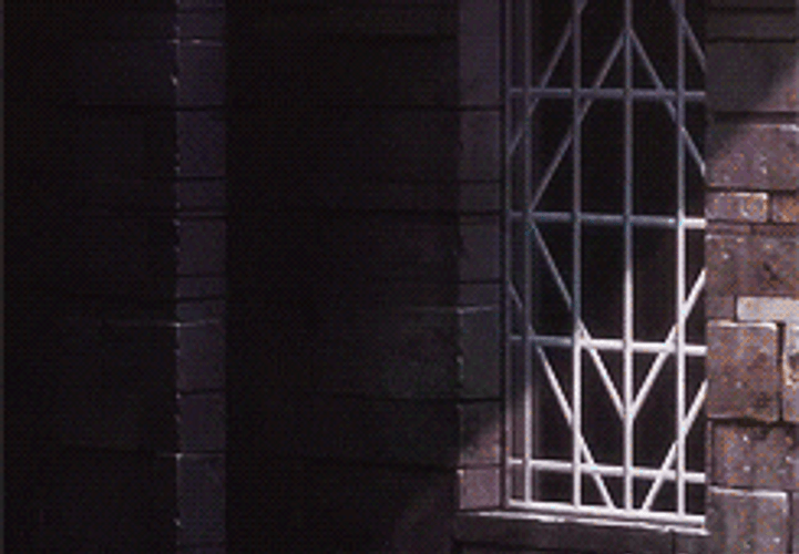 SAO Kirito Sitting Against Wall GIF