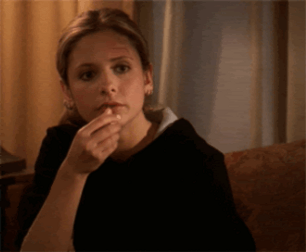 Sarah Michelle Gellar Slowly Eating Popcorn Meme GIF