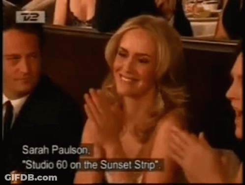 Sarah Paulson Is Applauding While Sitting In A Row Of People GIF