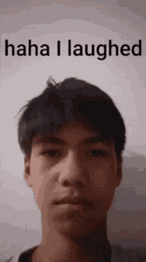 Sarcastic Laugh Serious Boy Selfie Meme GIF