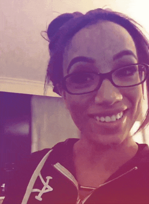 Sasha Banks Finger Bite Wearing Eyeglasses GIF