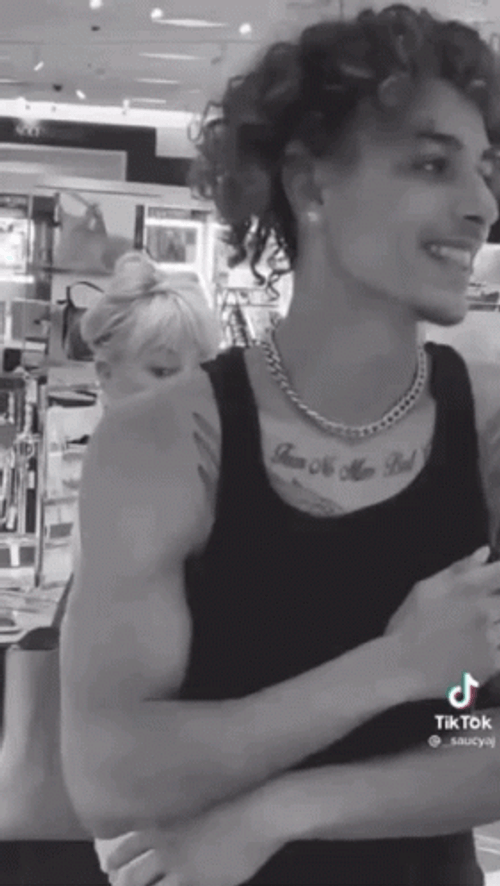 Sassy Cougar Checking Out Young Man GIF