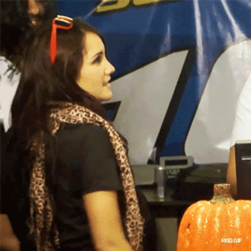 Sassy Girl Biting Giant Bone GIF