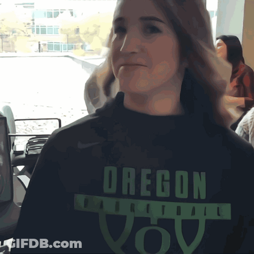 Sassy Lady Wearing Oregon Shirt GIF