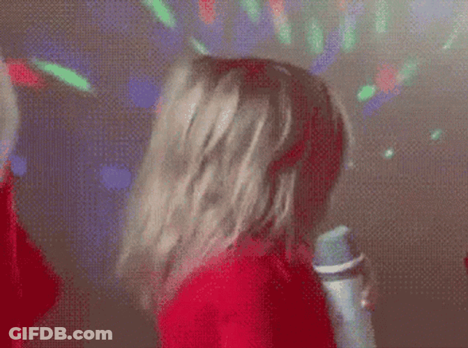 Sassy Little Girl Holding Microphone GIF