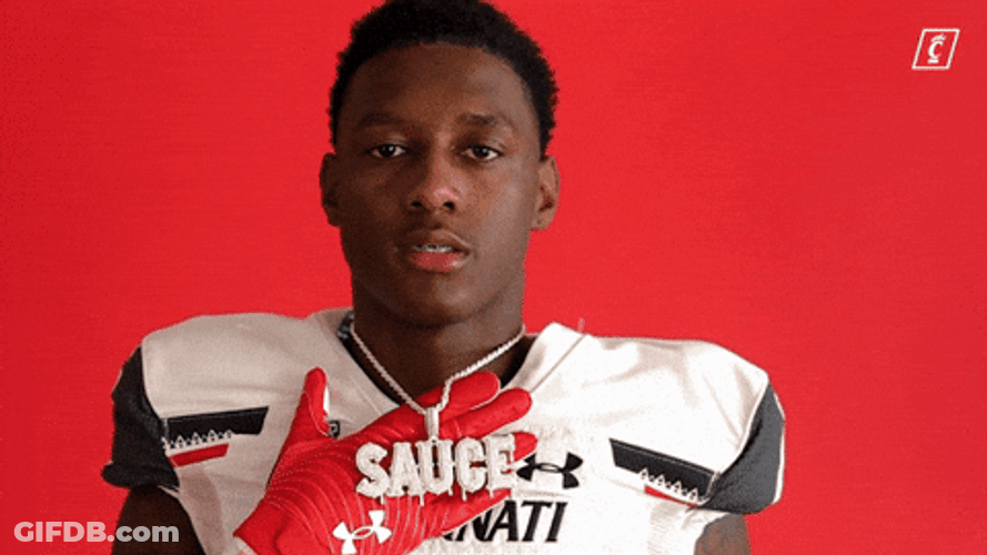 Sauce Gardner Flexing His Necklace GIF
